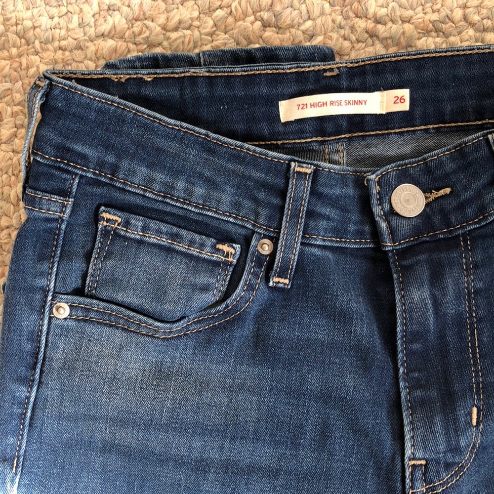 Levi’s 721 High Rise Distressed Skinny Jeans